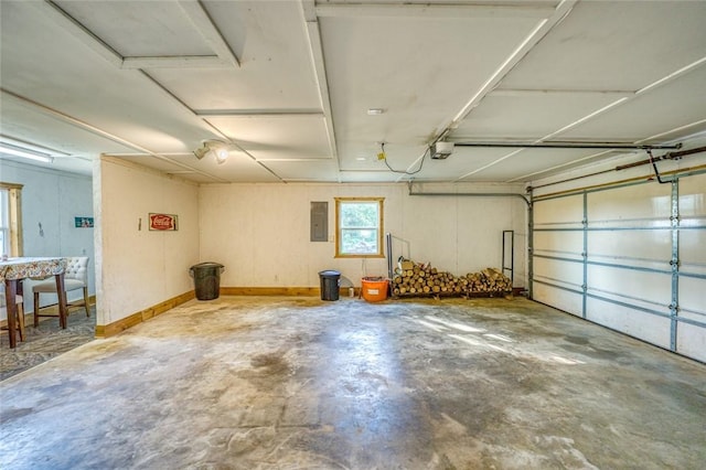 garage featuring a garage door opener and electric panel