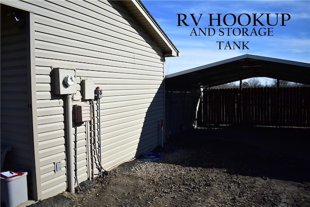 view of property exterior with a carport