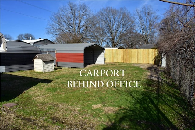 view of yard with a carport