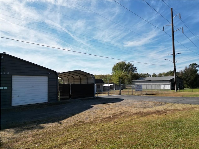 view of yard featuring a carport