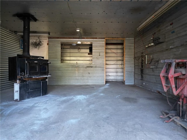 garage featuring a wood stove