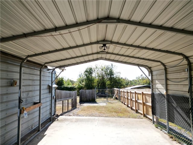 view of parking / parking lot with a carport