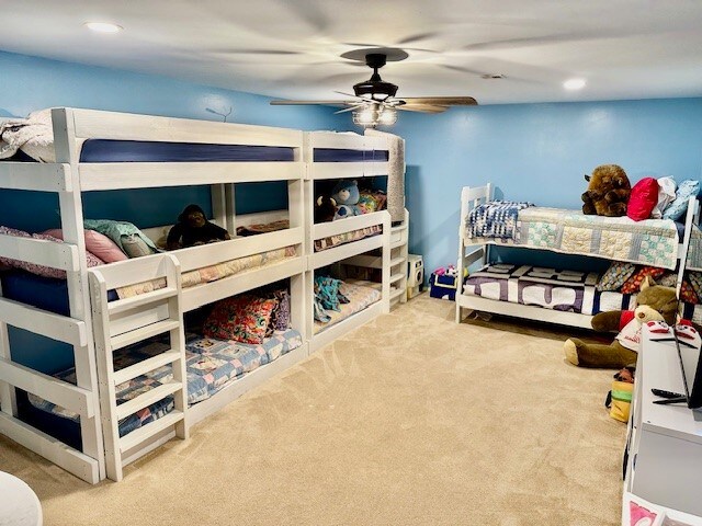 bedroom featuring carpet and ceiling fan