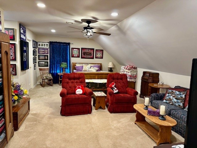 bedroom with carpet floors, ceiling fan, and vaulted ceiling