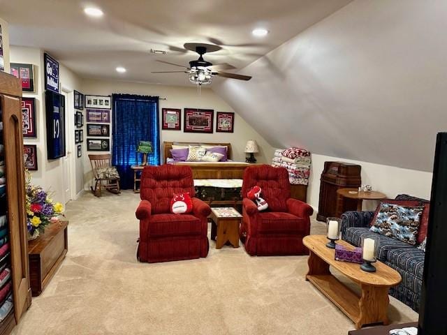 living area with light carpet, lofted ceiling, ceiling fan, and recessed lighting