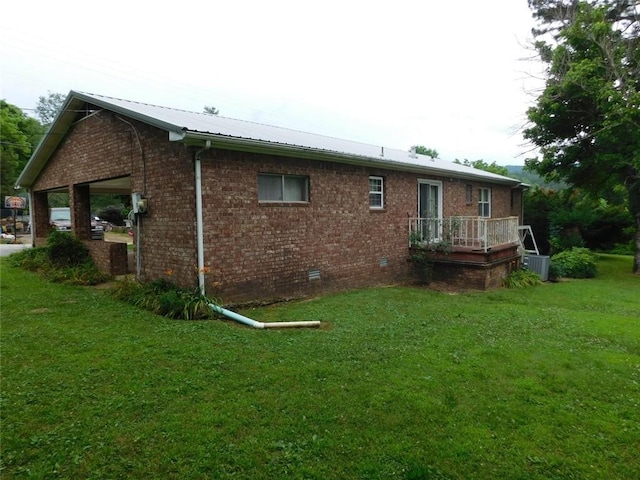 back of house with a yard