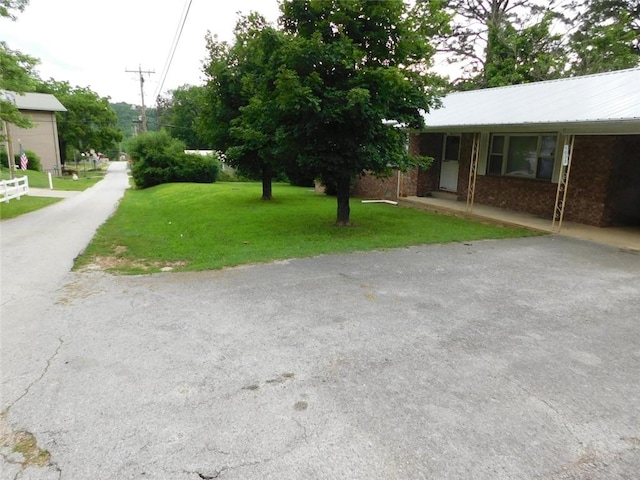 exterior space with a lawn