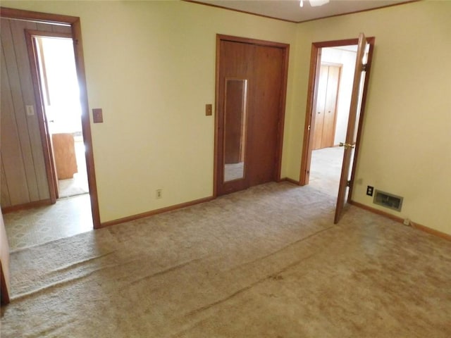 spare room with light carpet