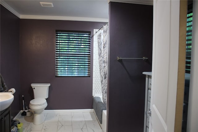 bathroom with vanity, toilet, crown molding, and curtained shower