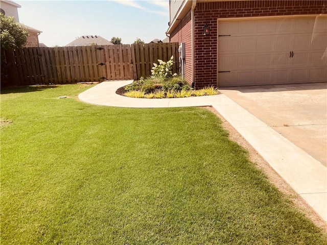 view of yard featuring a garage