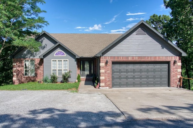 single story home featuring a garage