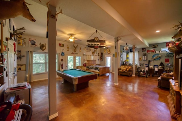 game room with ceiling fan, concrete flooring, and pool table