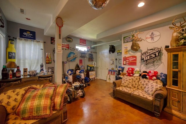 living room with concrete flooring