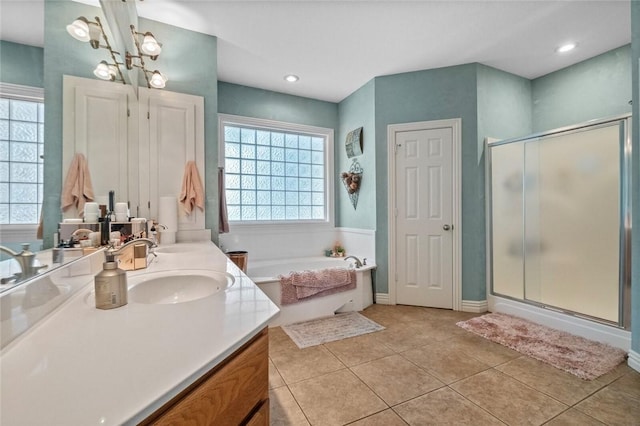 bathroom with vanity, tile patterned floors, independent shower and bath, and a chandelier