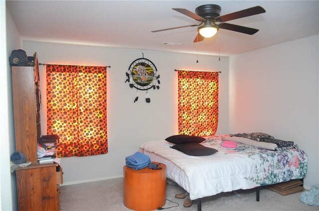 bedroom with carpet flooring and ceiling fan