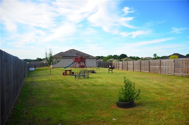 view of yard featuring a playground