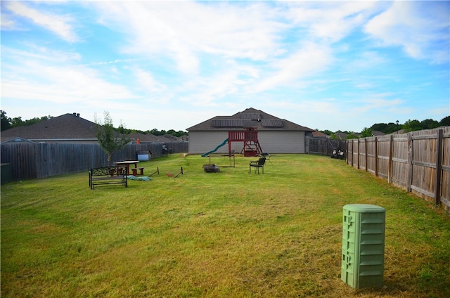 view of yard featuring a playground