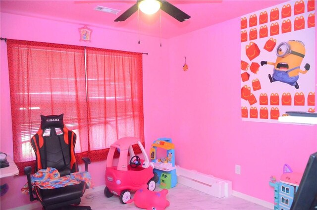 recreation room with ceiling fan