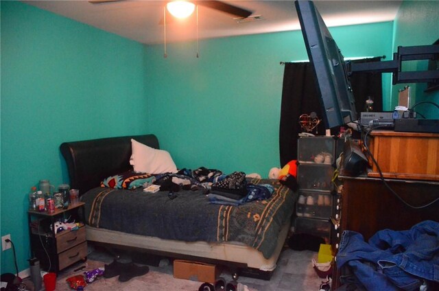 bedroom featuring ceiling fan and carpet flooring