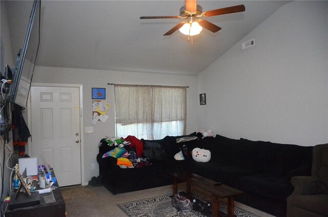 carpeted living room featuring lofted ceiling and ceiling fan