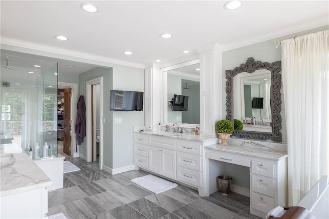 bathroom with vanity and crown molding