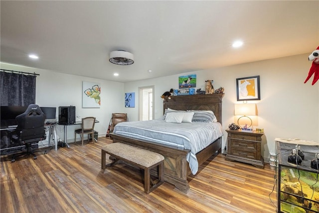 bedroom with light hardwood / wood-style floors