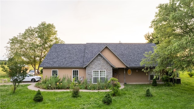 view of front of home with a front yard