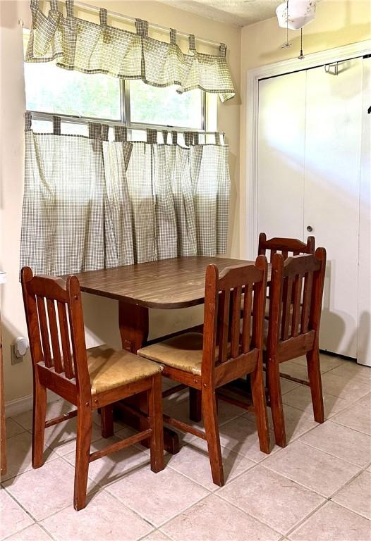 view of tiled dining space