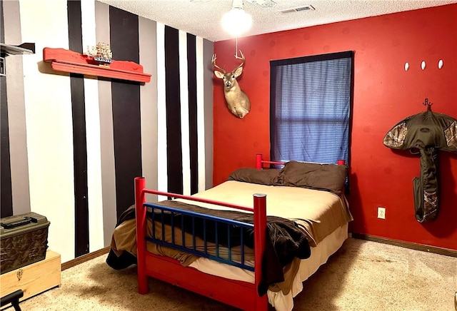 bedroom featuring a textured ceiling