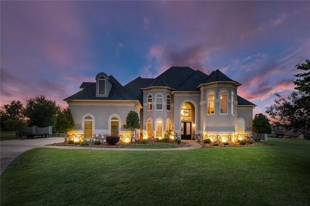 view of front of house with a lawn