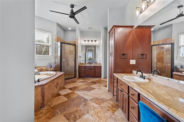 bathroom with vanity, ceiling fan, and independent shower and bath