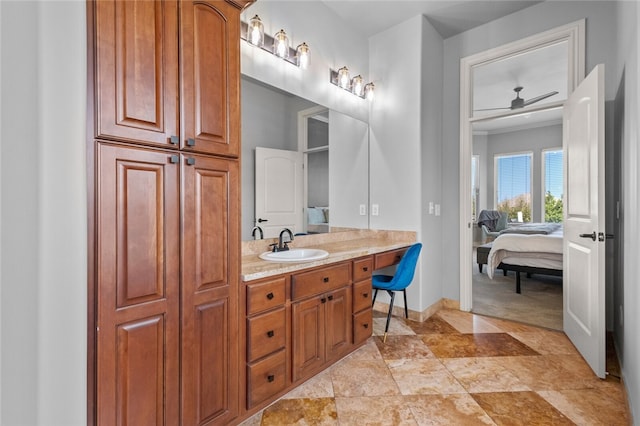 bathroom featuring vanity and ceiling fan