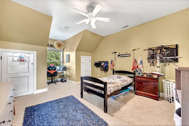 carpeted bedroom with baseboards, lofted ceiling, visible vents, and a ceiling fan