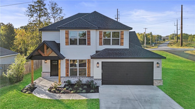 view of front facade with a garage and a front lawn