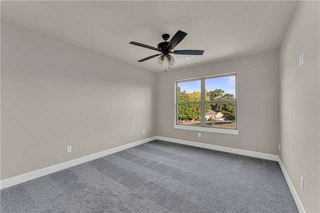 carpeted empty room with ceiling fan