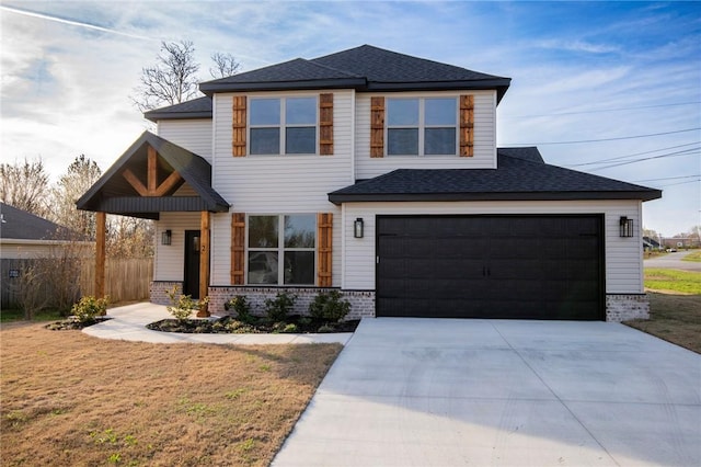 view of front of house featuring roof with shingles, driveway, a front lawn, and brick siding