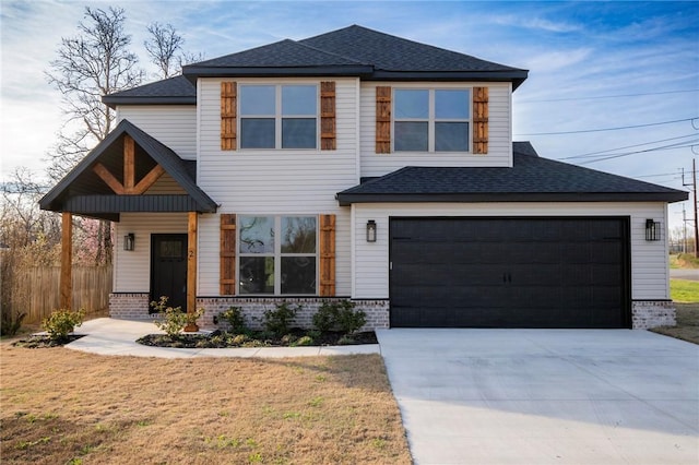 view of front of house featuring brick siding, roof with shingles, fence, and concrete driveway
