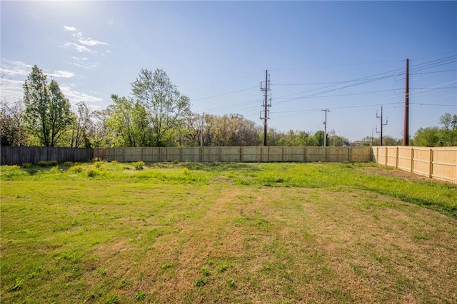 view of yard with fence