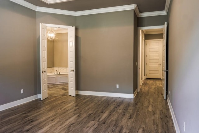 unfurnished bedroom with ornamental molding, dark wood-type flooring, and a chandelier