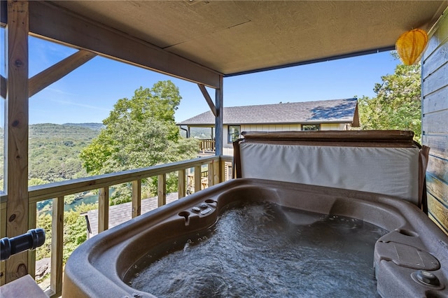 balcony with a hot tub