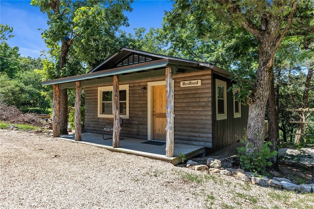 view of outdoor structure with a porch