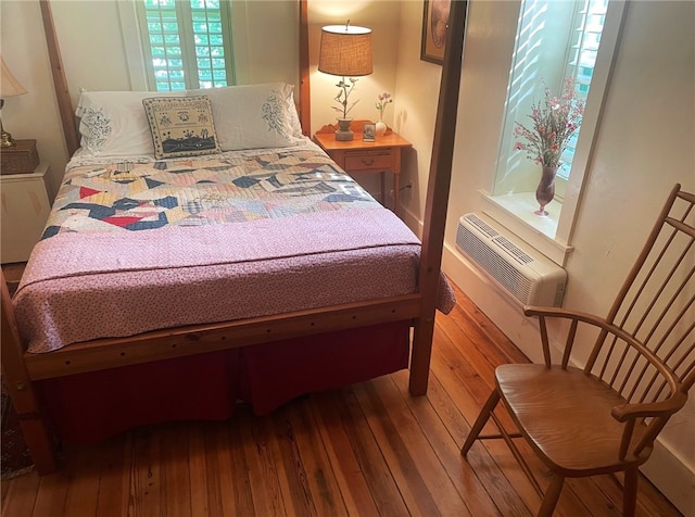 bedroom featuring hardwood / wood-style flooring