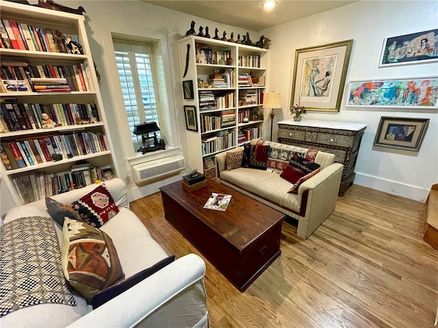 sitting room featuring hardwood / wood-style floors