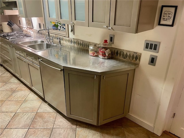 kitchen featuring sink, light tile flooring, and appliances with stainless steel finishes