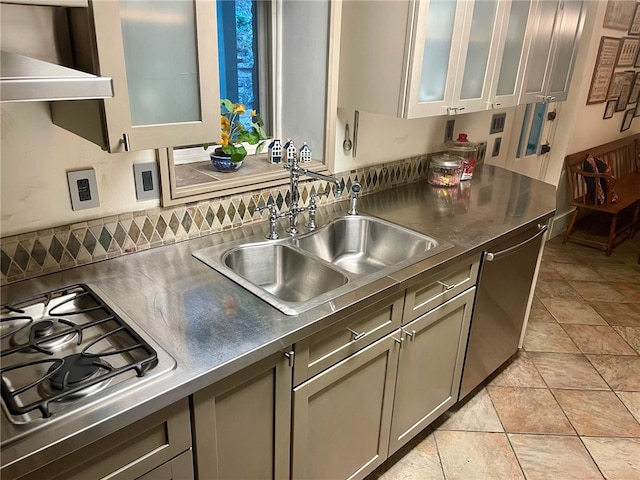 kitchen featuring light tile flooring, stainless steel counters, custom exhaust hood, sink, and appliances with stainless steel finishes