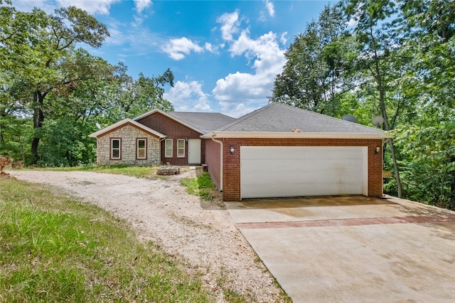 single story home featuring a garage