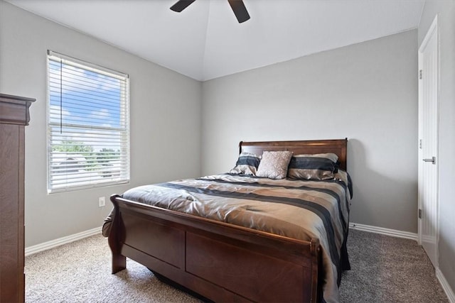 bedroom with ceiling fan, carpet, and lofted ceiling