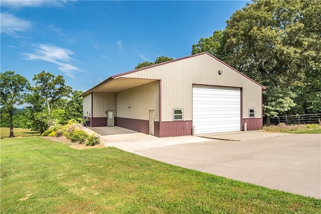 garage with a yard