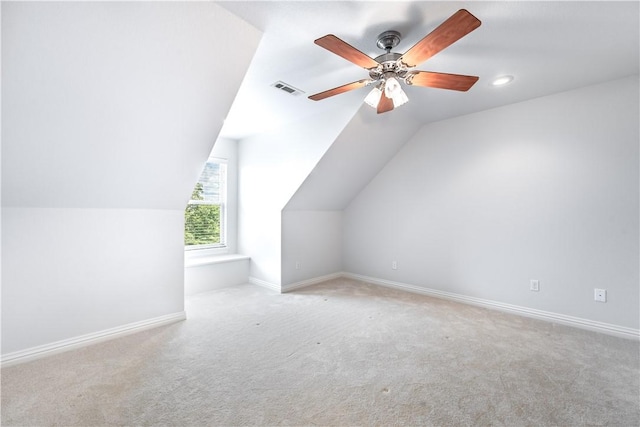 bonus room with light colored carpet, ceiling fan, and lofted ceiling