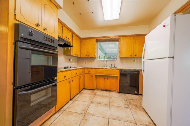 kitchen featuring black appliances, backsplash, sink, and light tile patterned flooring